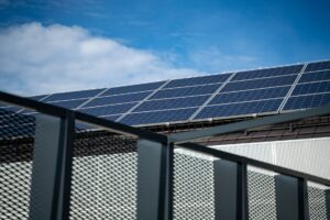 Large solar panel array representing clean energy infrastructure investment