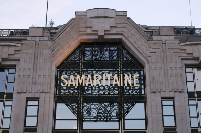Interior of a high-end luxury department store with designer displays