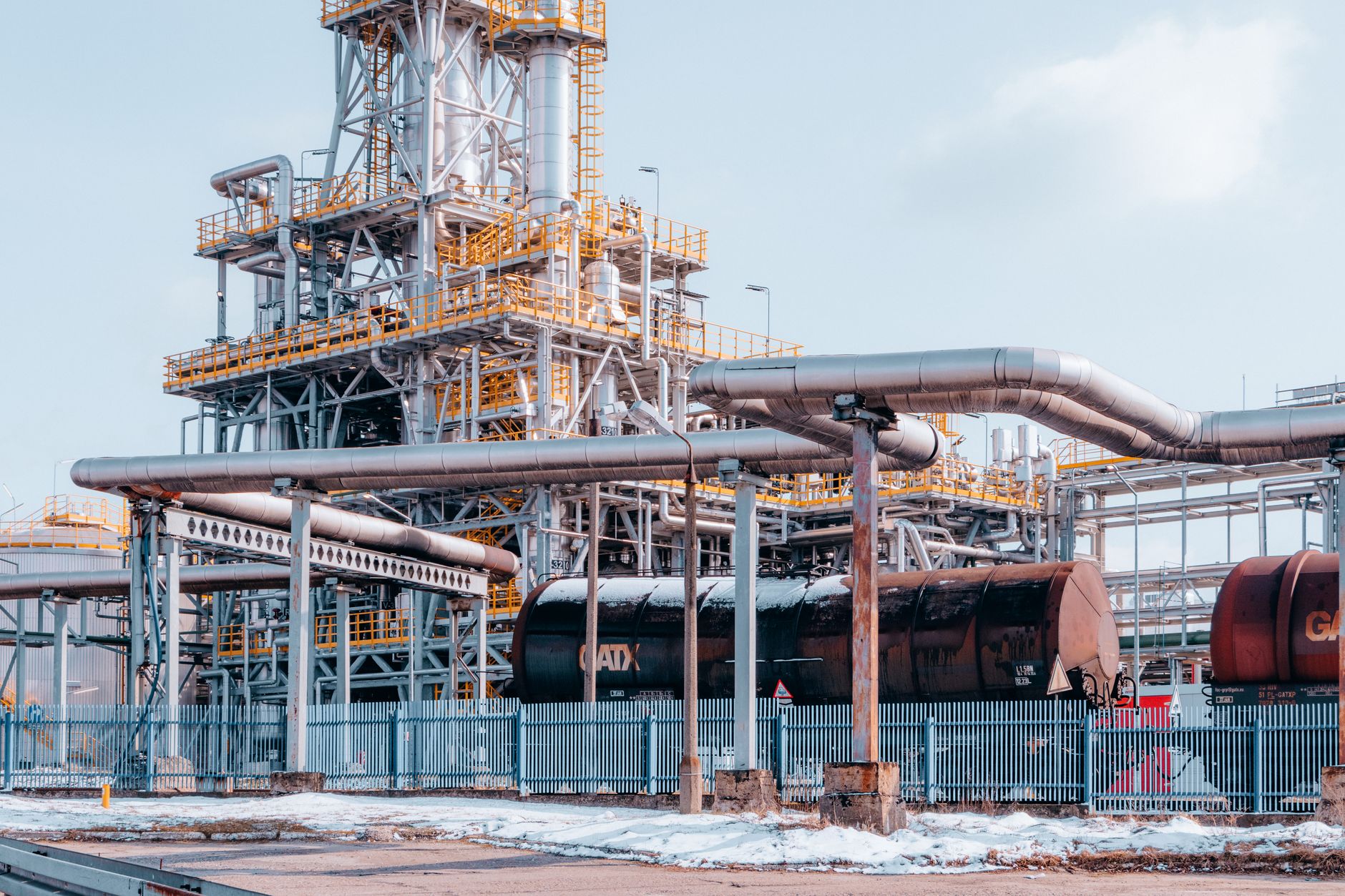 Industrial oil pipeline infrastructure symbolizing Iran's energy sector under sanctions