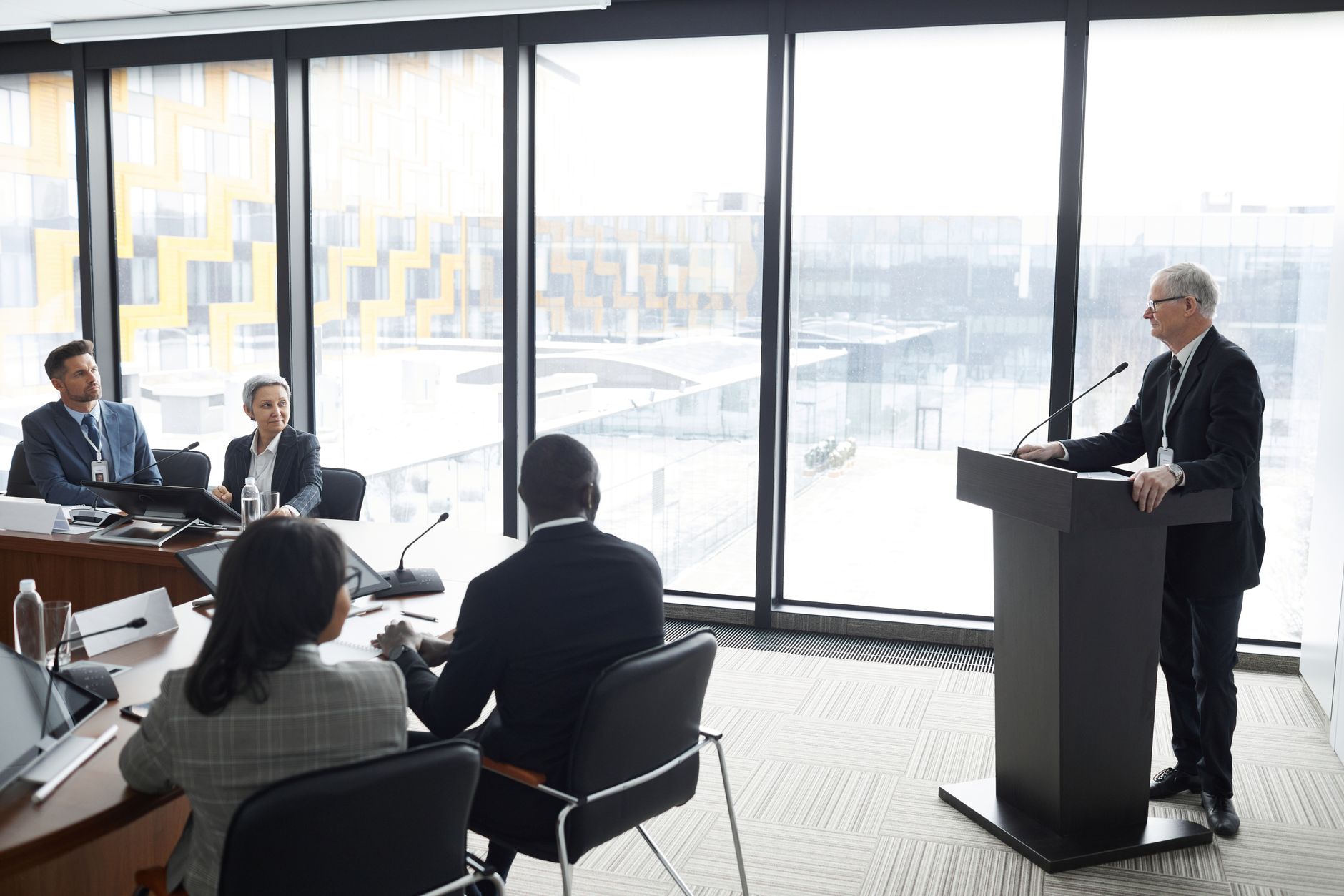 Business professionals reviewing documents in a corporate strategy meeting