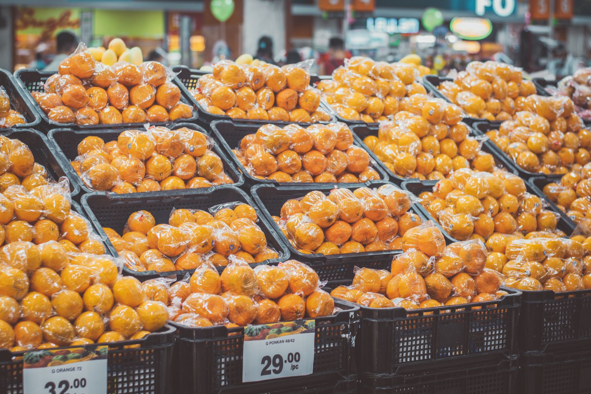 Consumer examining prices on grocery store shelves amid inflation