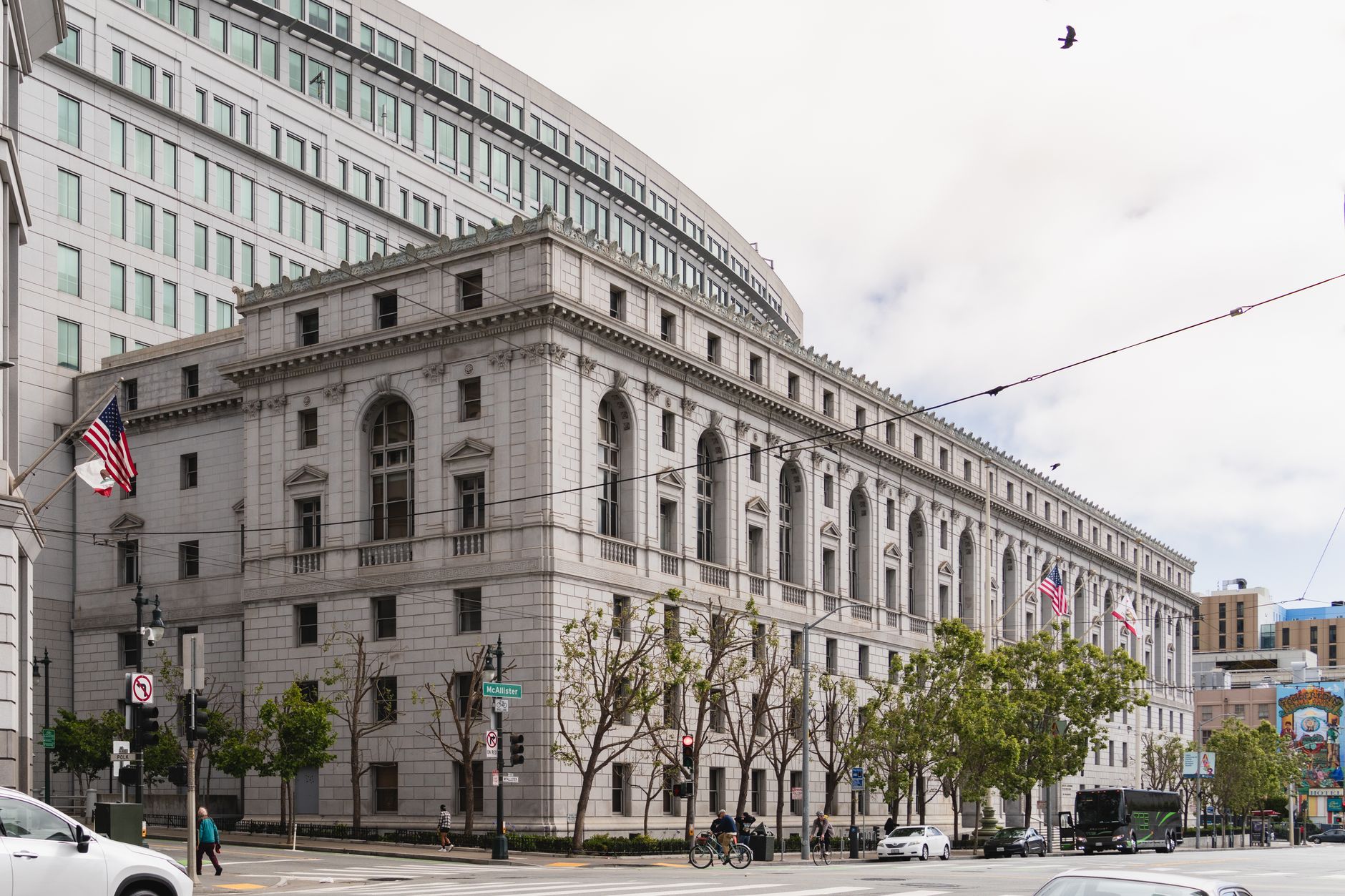 Federal courthouse exterior representing ongoing litigation over grant cancellations