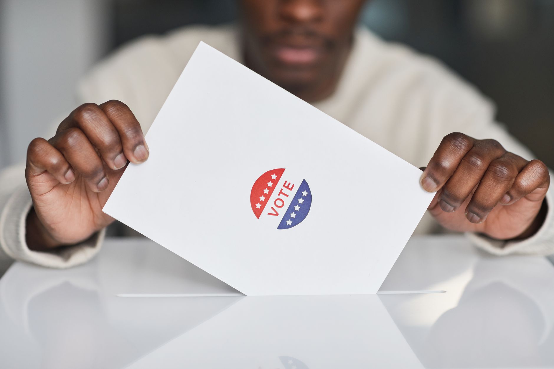 A mail-in ballot envelope on a table ready to be submitted