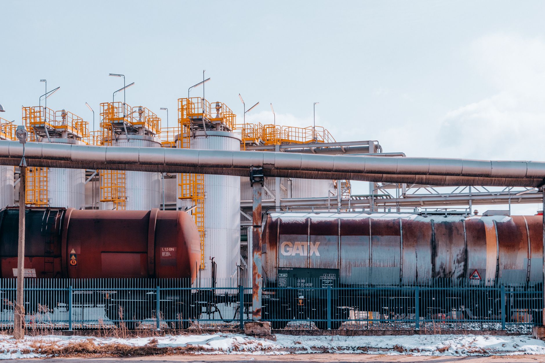 Oil pipeline infrastructure representing rising crude prices amid geopolitical tension