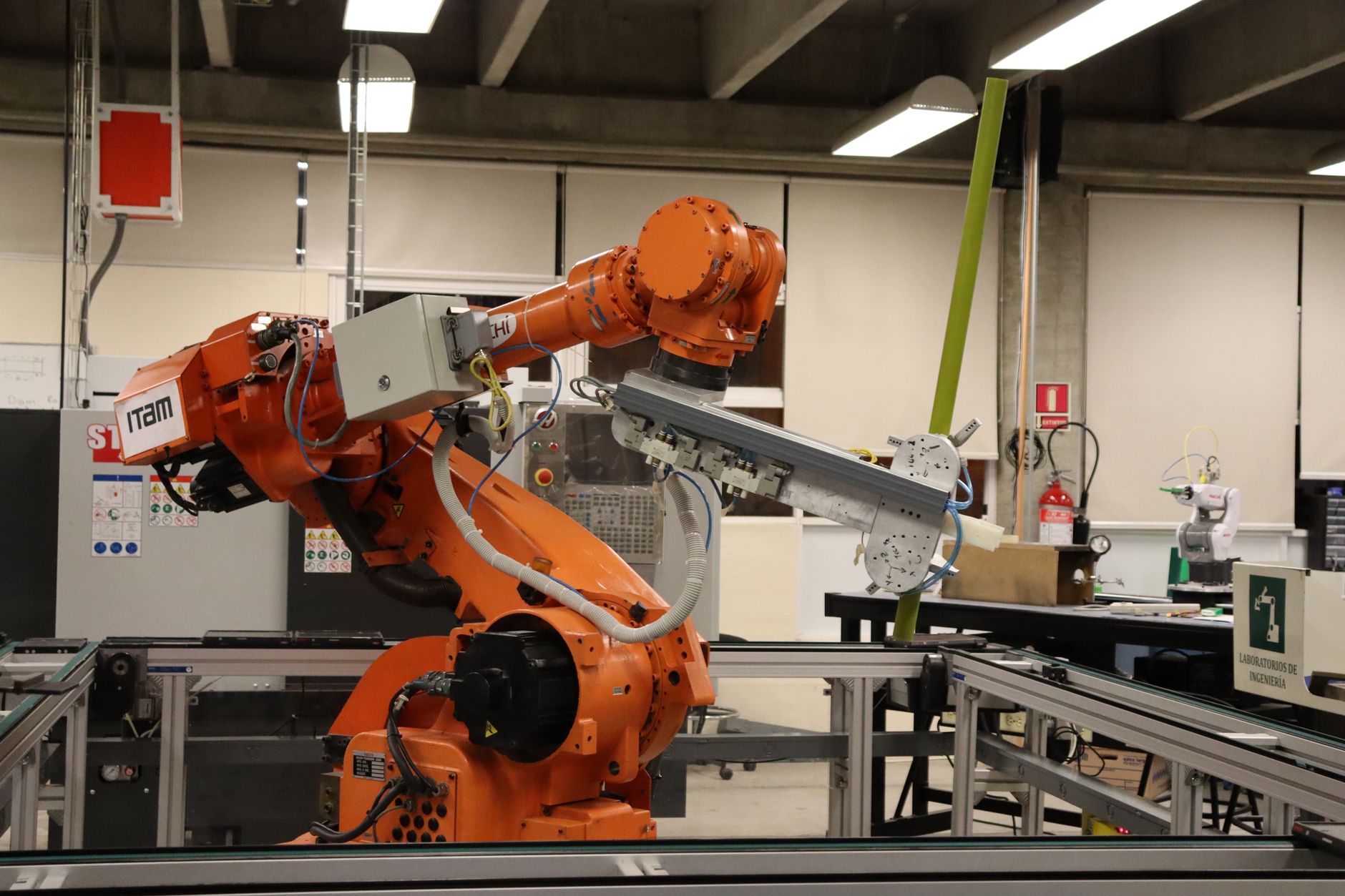 Workers on a modern manufacturing floor representing U.S. industrial production ambitions