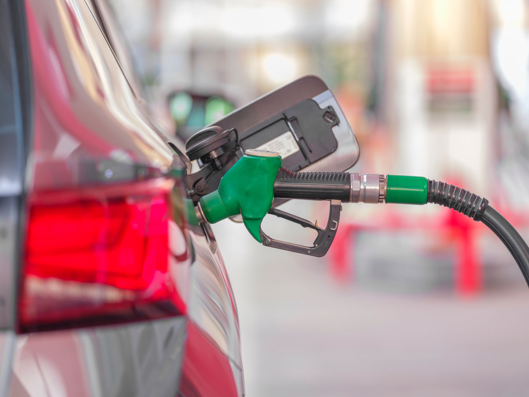 Close-up of a fuel pump nozzle at an empty gas station