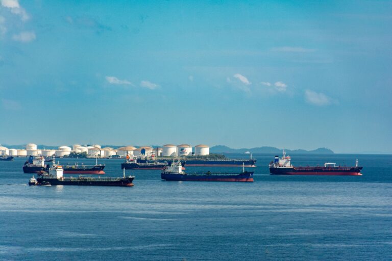 Large oil tanker crossing open ocean waters under overcast skies
