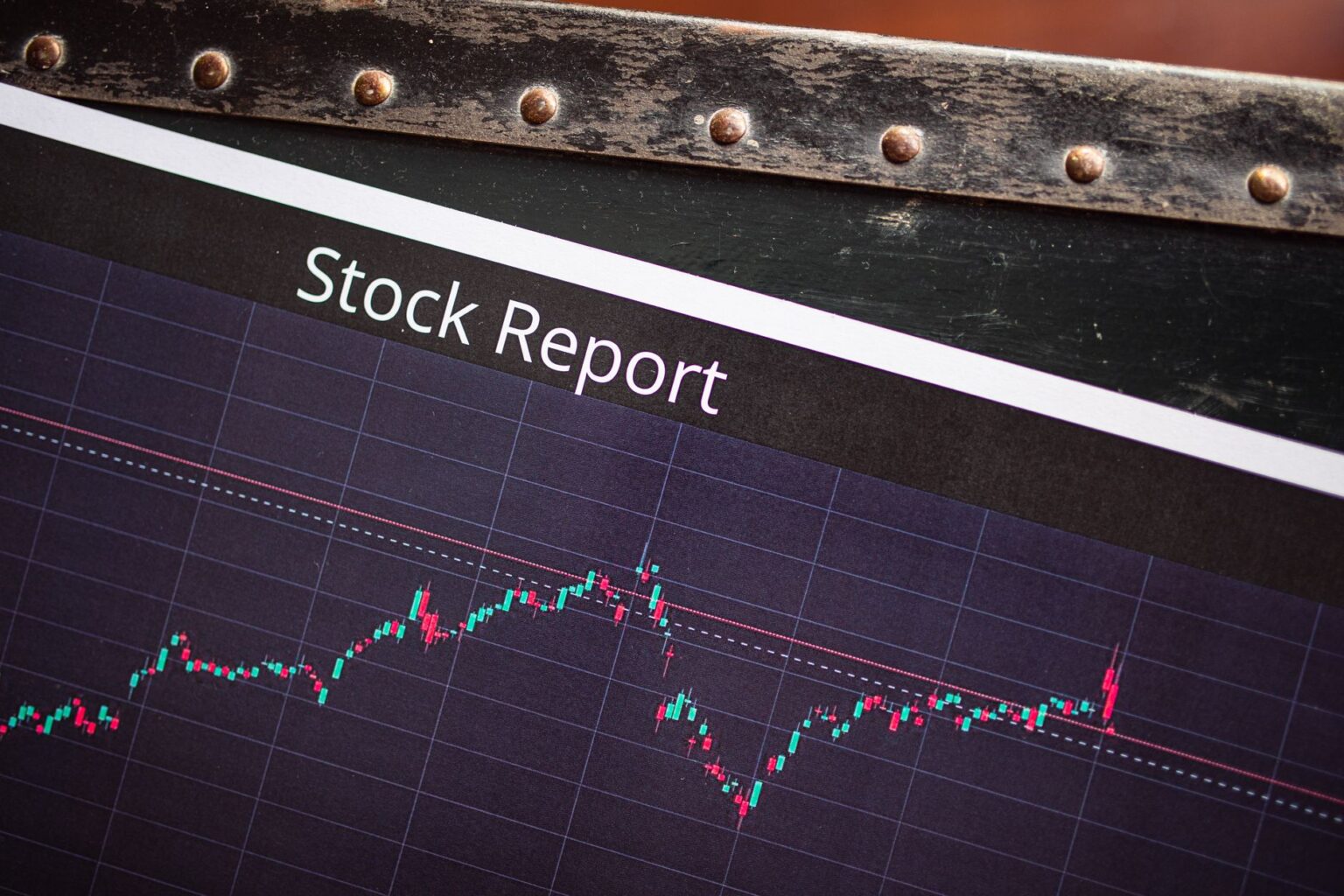 Stock market trading screens showing price movements and index levels