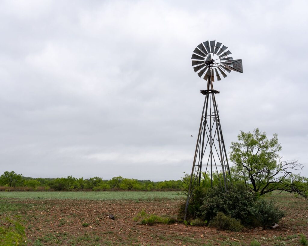 Wide open rural Texas land with flat terrain and sparse vegetation