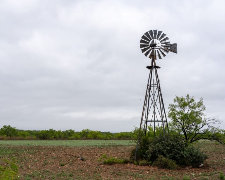 Wide open rural Texas land with flat terrain and sparse vegetation
