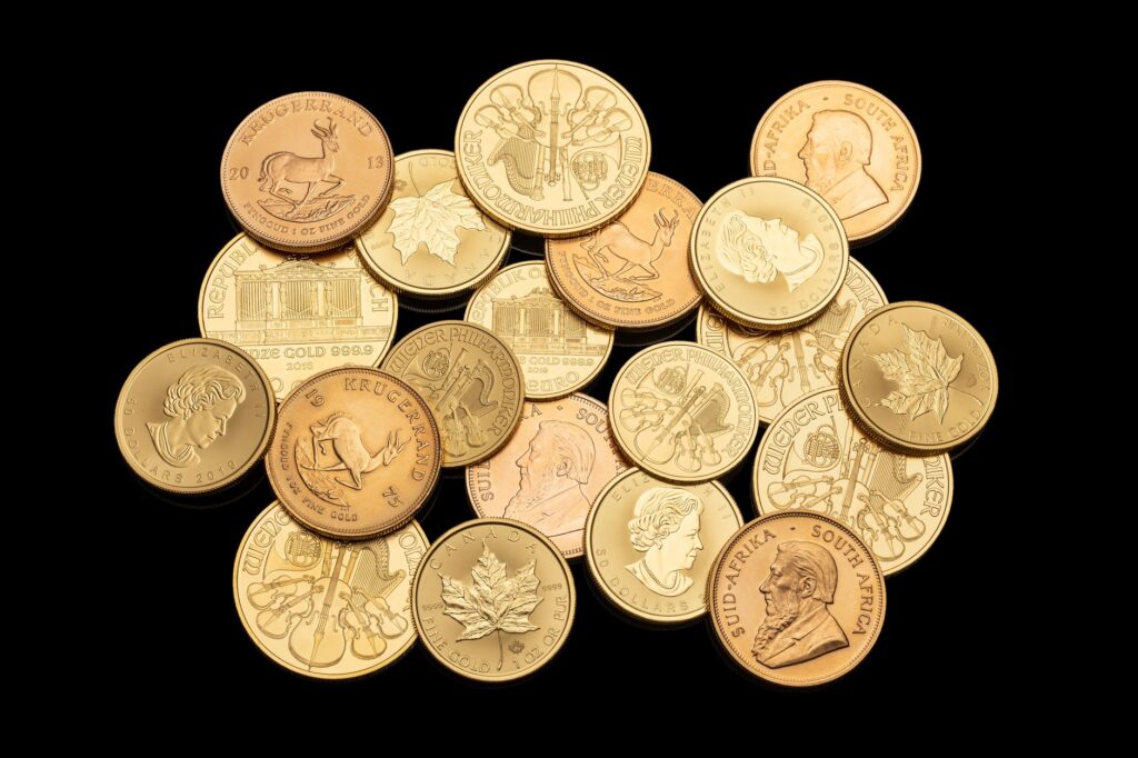Stacked gold bars representing precious metal investment amid dollar weakness