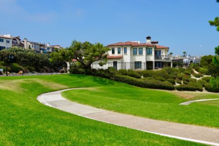 Aerial view of a large luxury estate in California with manicured grounds