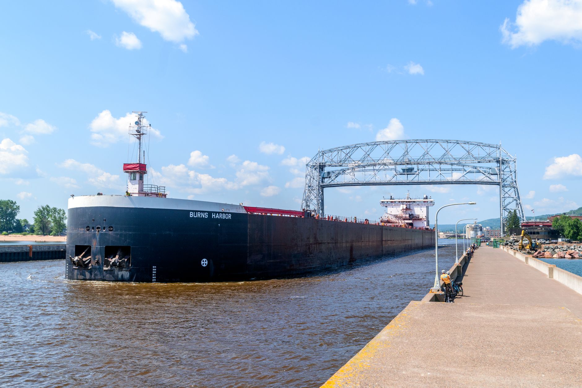 Cargo vessel navigating Great Lakes waterway