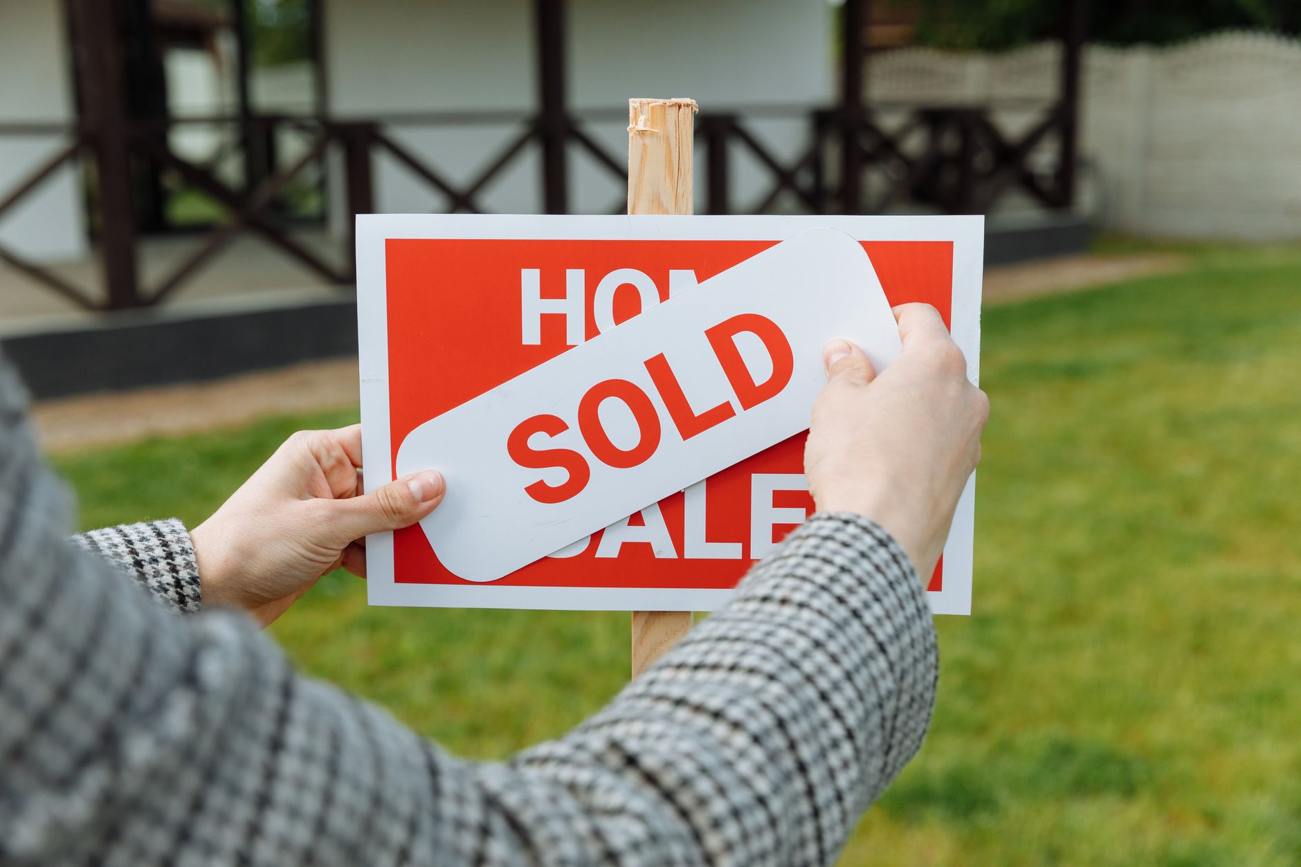 Real estate agent reviewing property documents at a desk