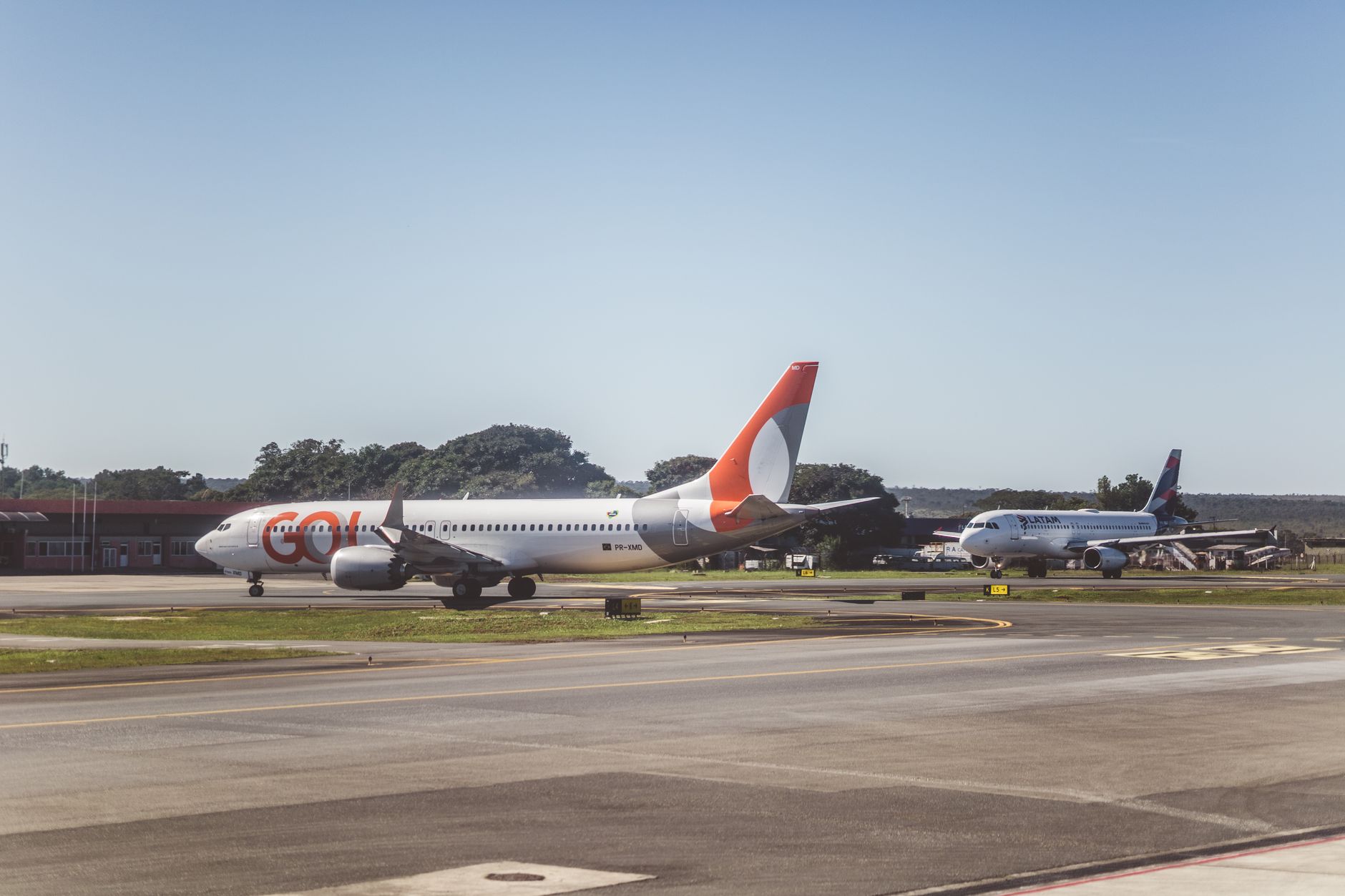 Commercial jet parked on an airport runway ready for delivery