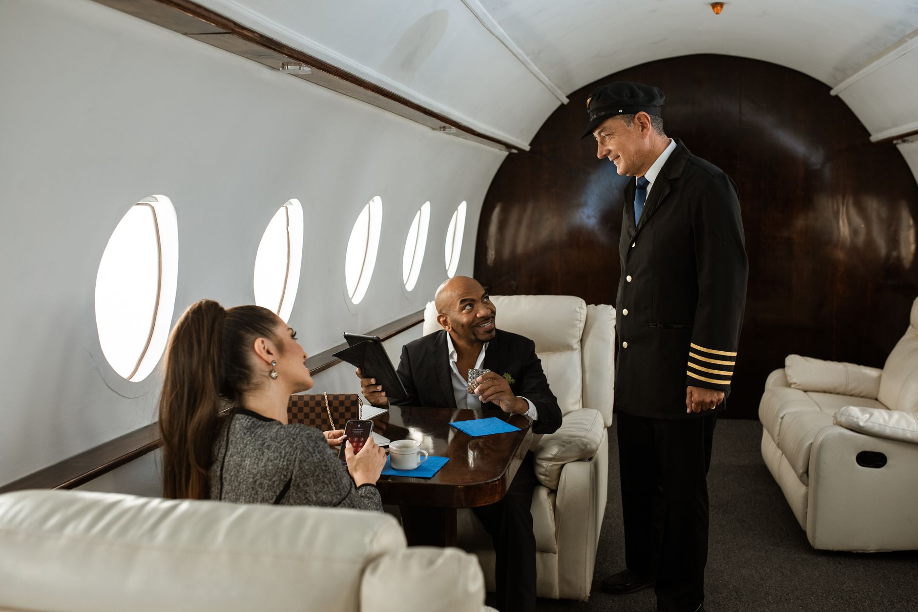 Business professionals reviewing aviation industry data at a conference table