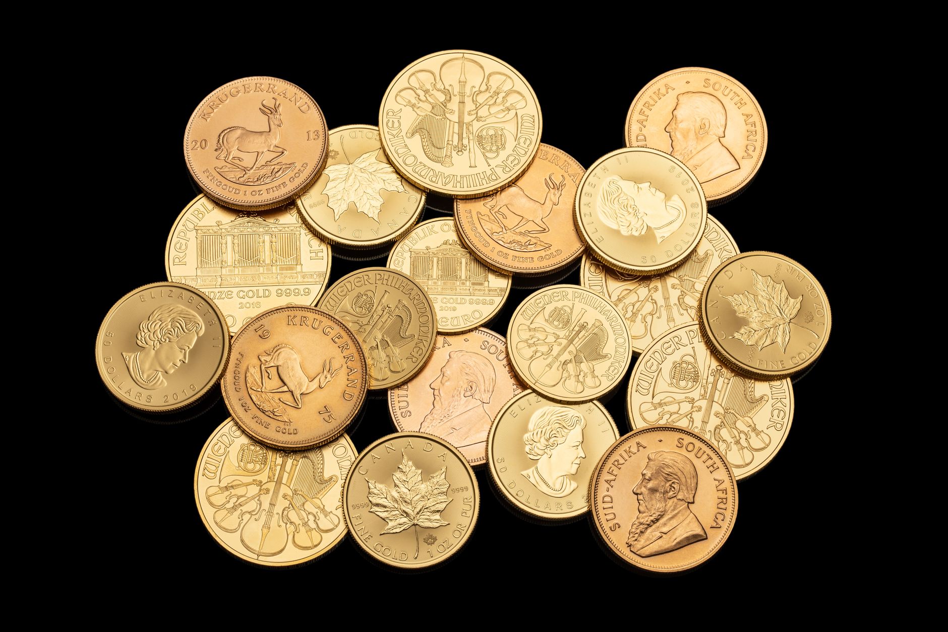 Gold coins arranged on a surface representing commodity investment