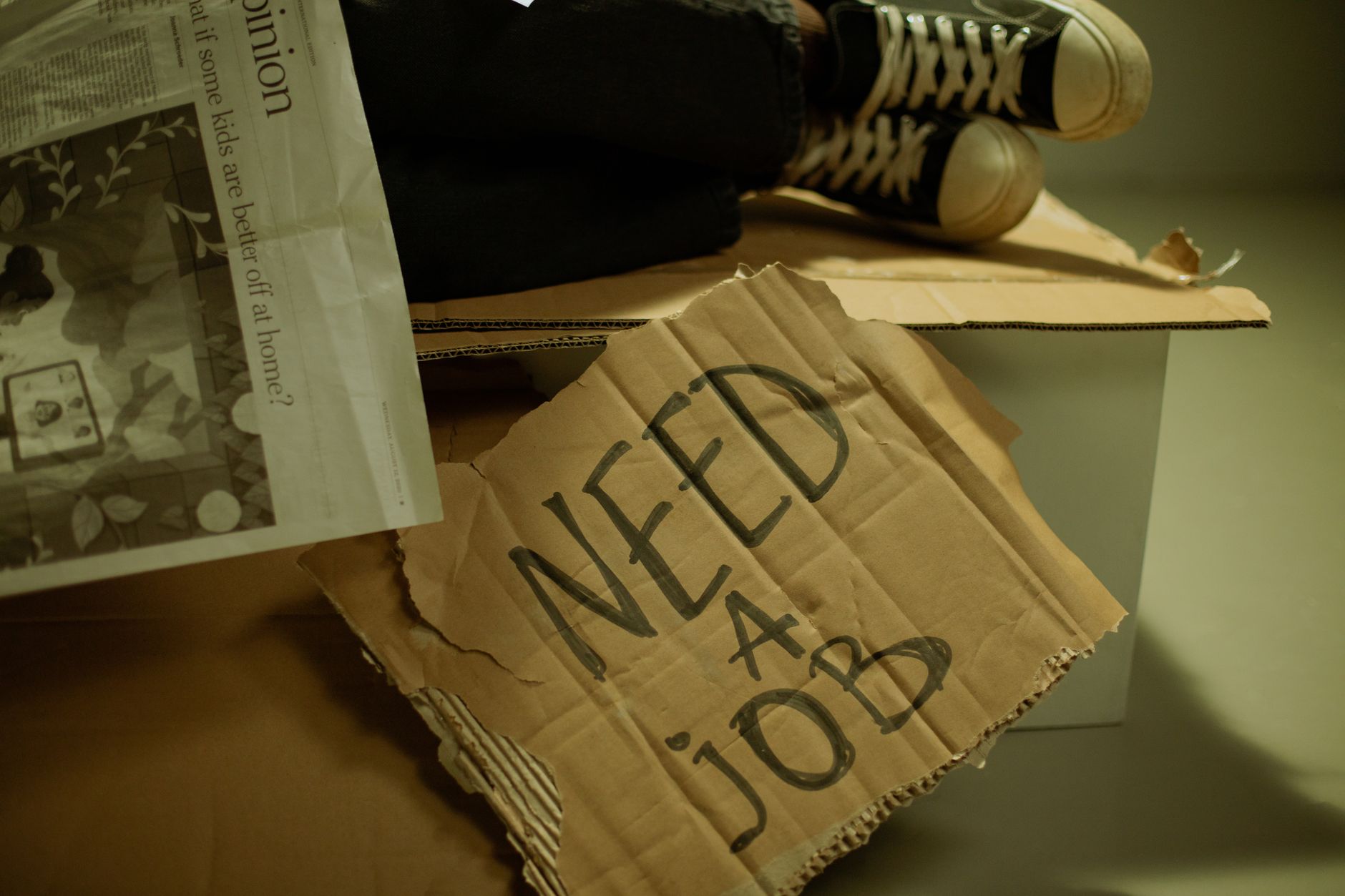 Job seekers waiting in line reflecting sluggish labor market conditions