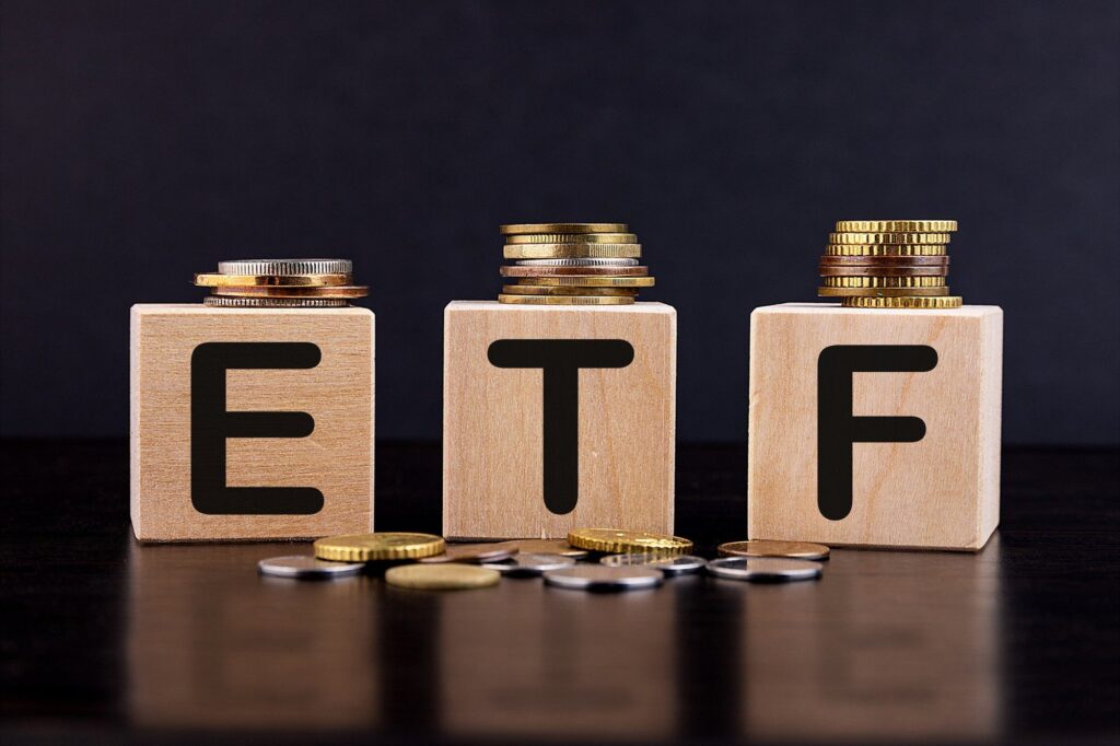 Investor reviewing dividend ETF performance on a laptop