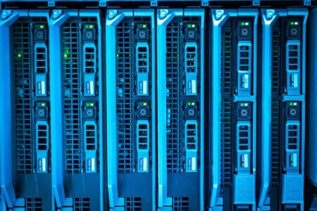 Rows of servers inside a modern data center facility