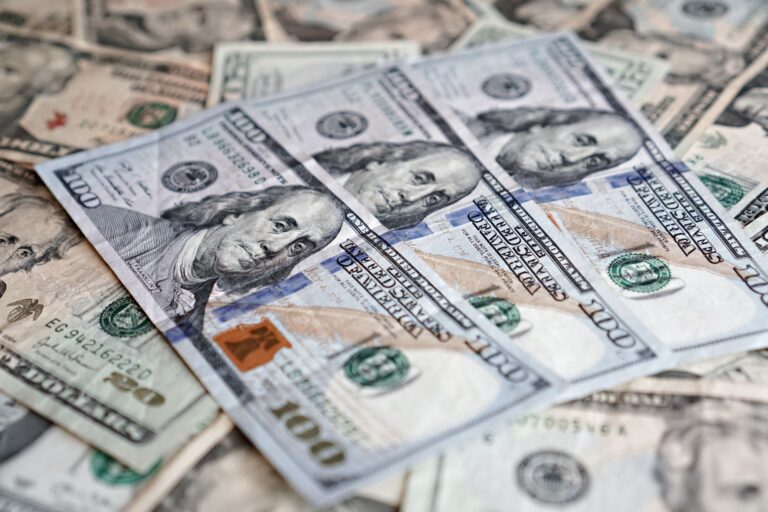 10-Year Treasury Yields Close In on 5% as Oil and Inflation Climb Close-up of U.S. Treasury bond certificates on a financial desk
