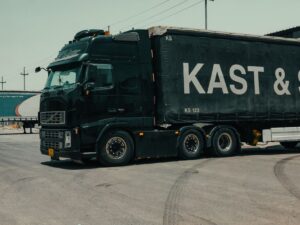 Diesel at Record Highs Is About to Hit Every Price Tag You See Semi-truck driving on a highway representing diesel-powered freight transport