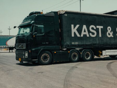 Semi-truck driving on a highway representing diesel-powered freight transport