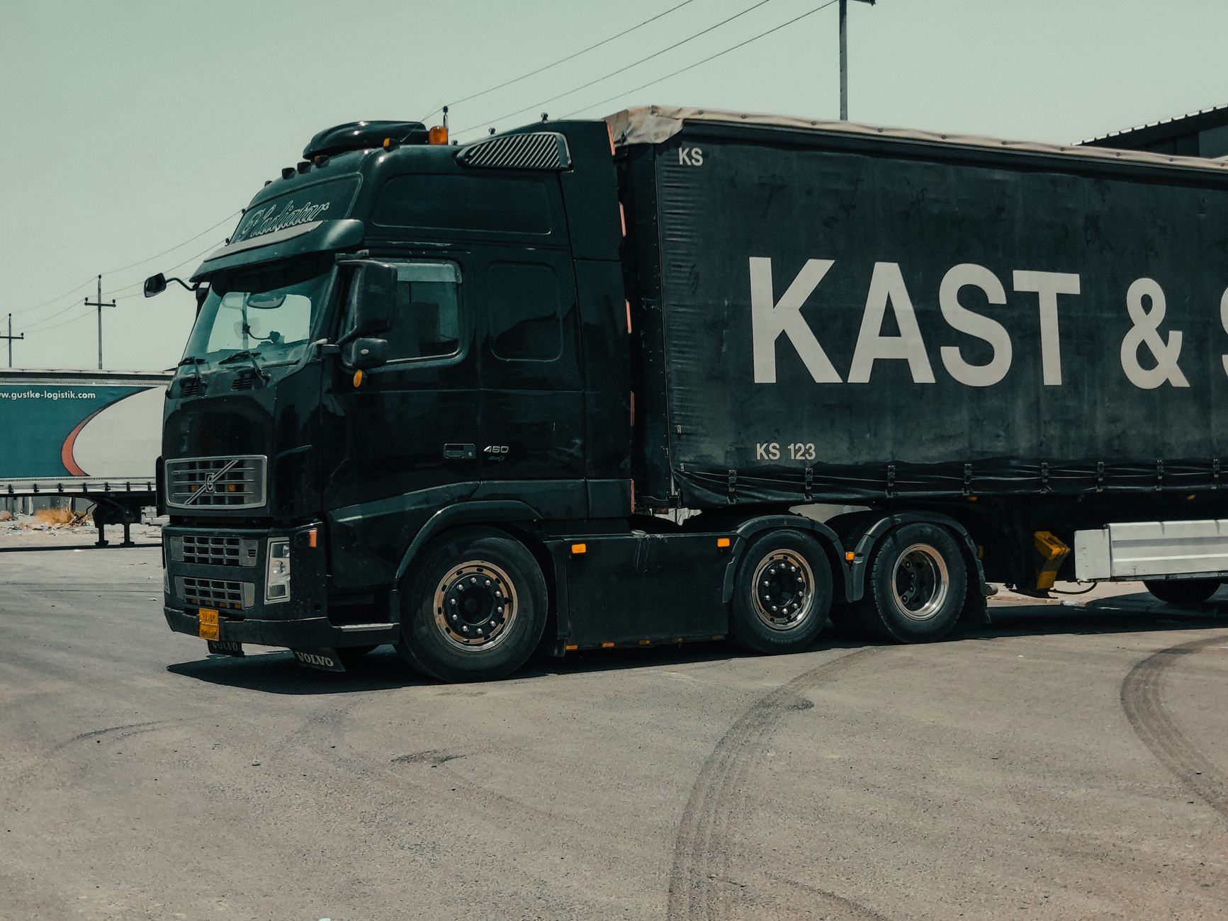 Semi-truck driving on a highway representing diesel-powered freight transport