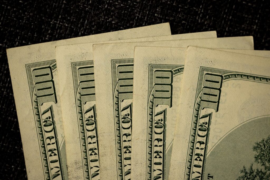 Close-up of US Treasury bond certificates on a financial desk