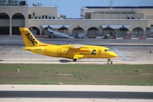 Emergency vehicles responding on an airport runway after an incident
