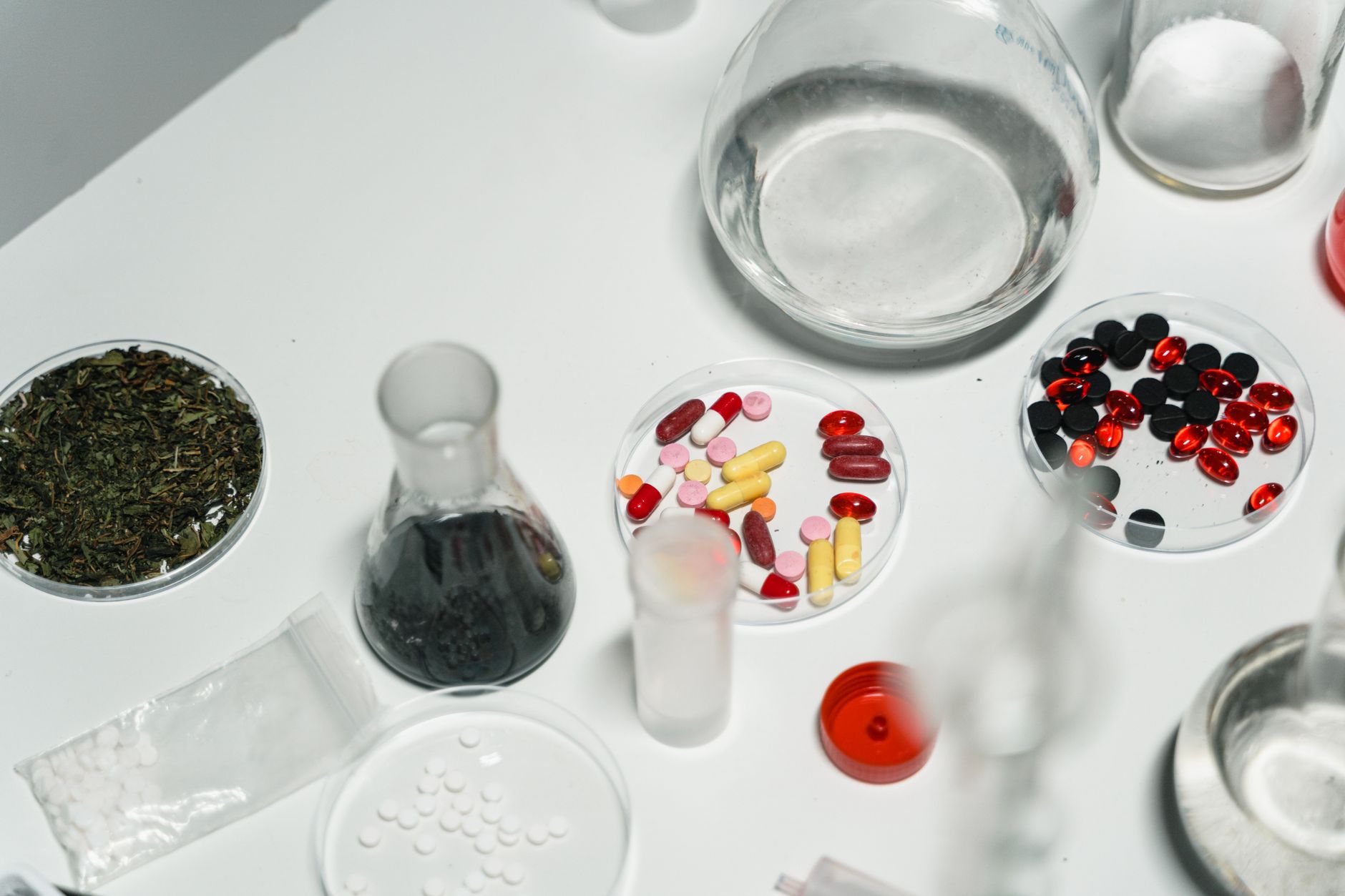 Scientists working in a pharmaceutical research lab under federal regulatory oversight