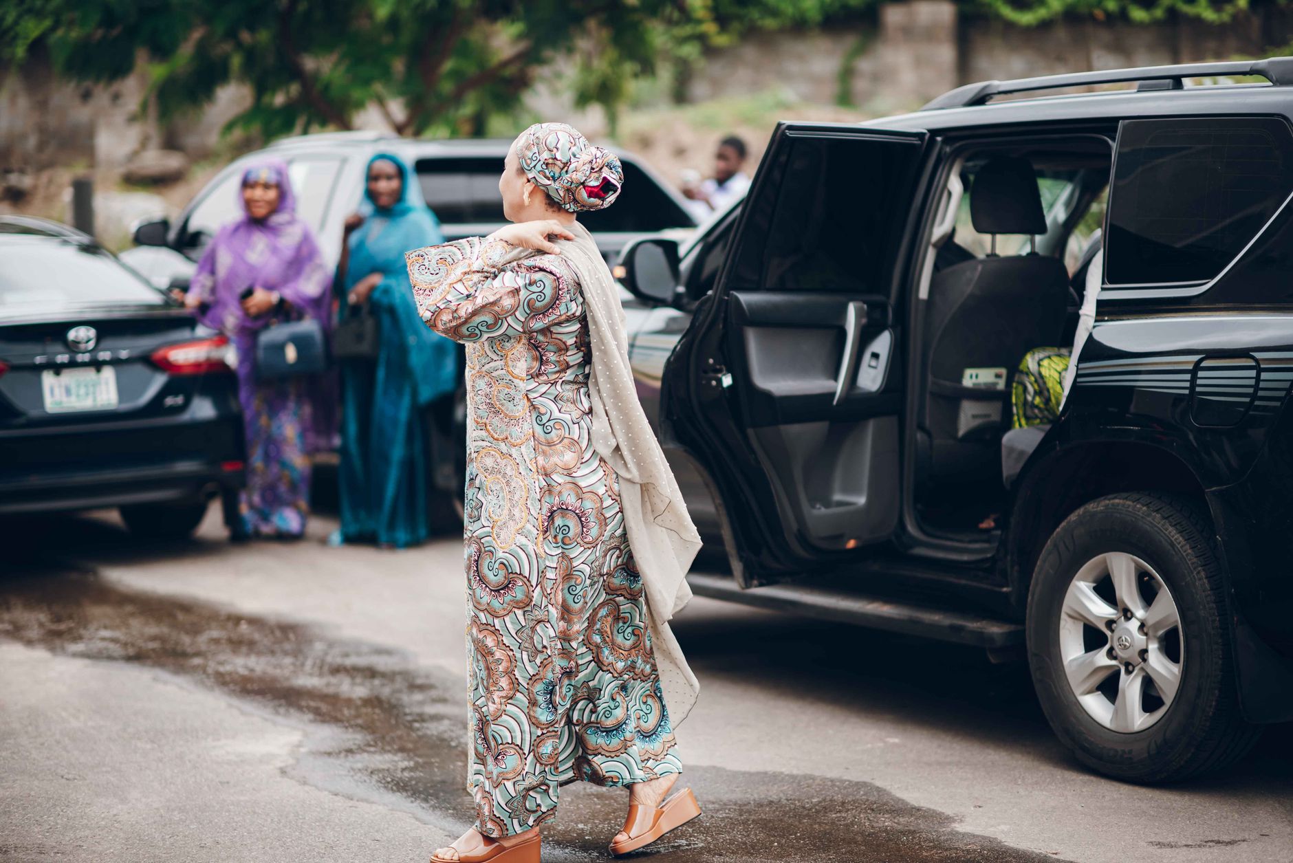 Two women in formal attire at an official diplomatic engagement