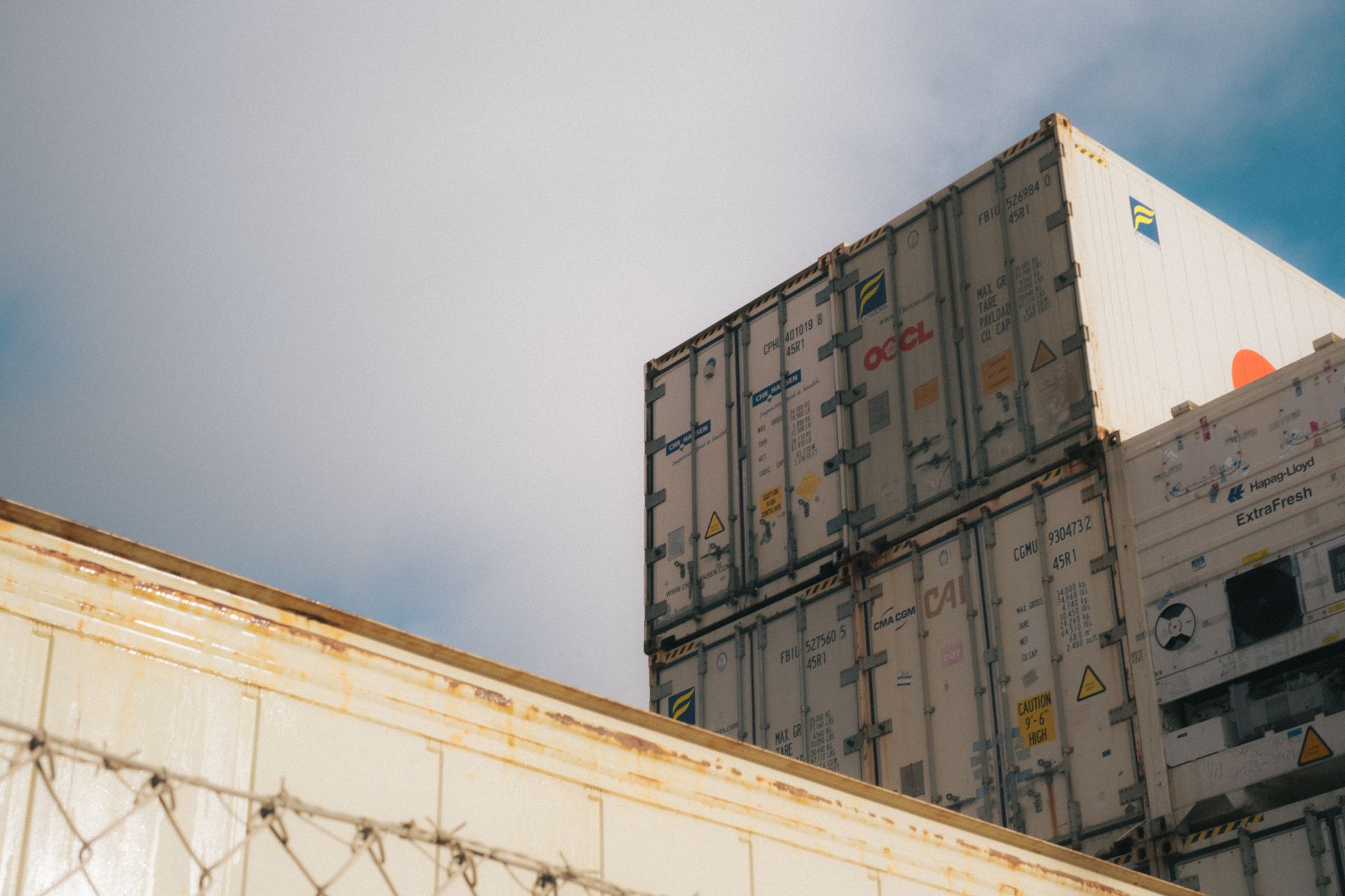 Warehouse shelves stocked with packaged consumer goods awaiting export