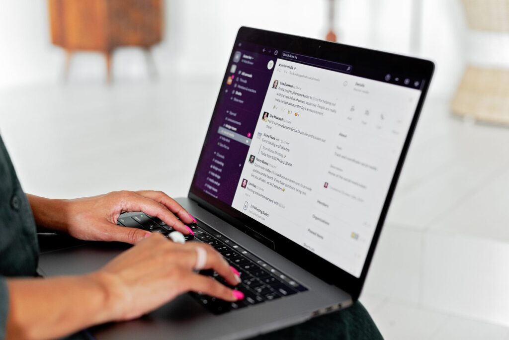 AI Is Giving Fake Job Recruiters a Dangerous Upgrade Person reviewing suspicious job offer email on laptop
