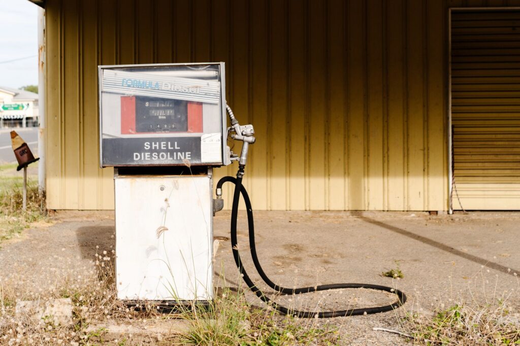 Close-up of a diesel fuel pump nozzle at a commercial filling station