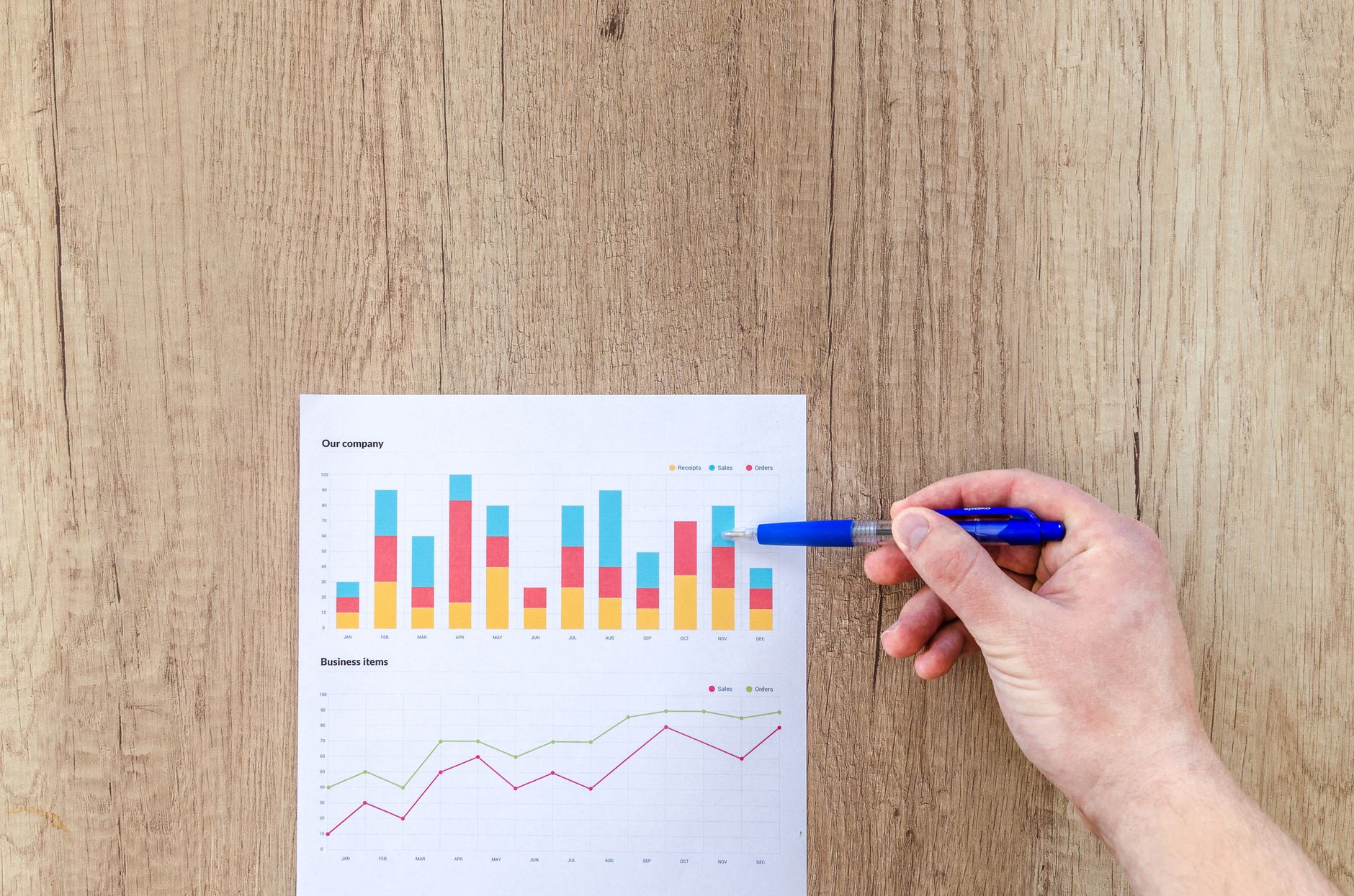 Person calculating investment fees and long-term portfolio costs