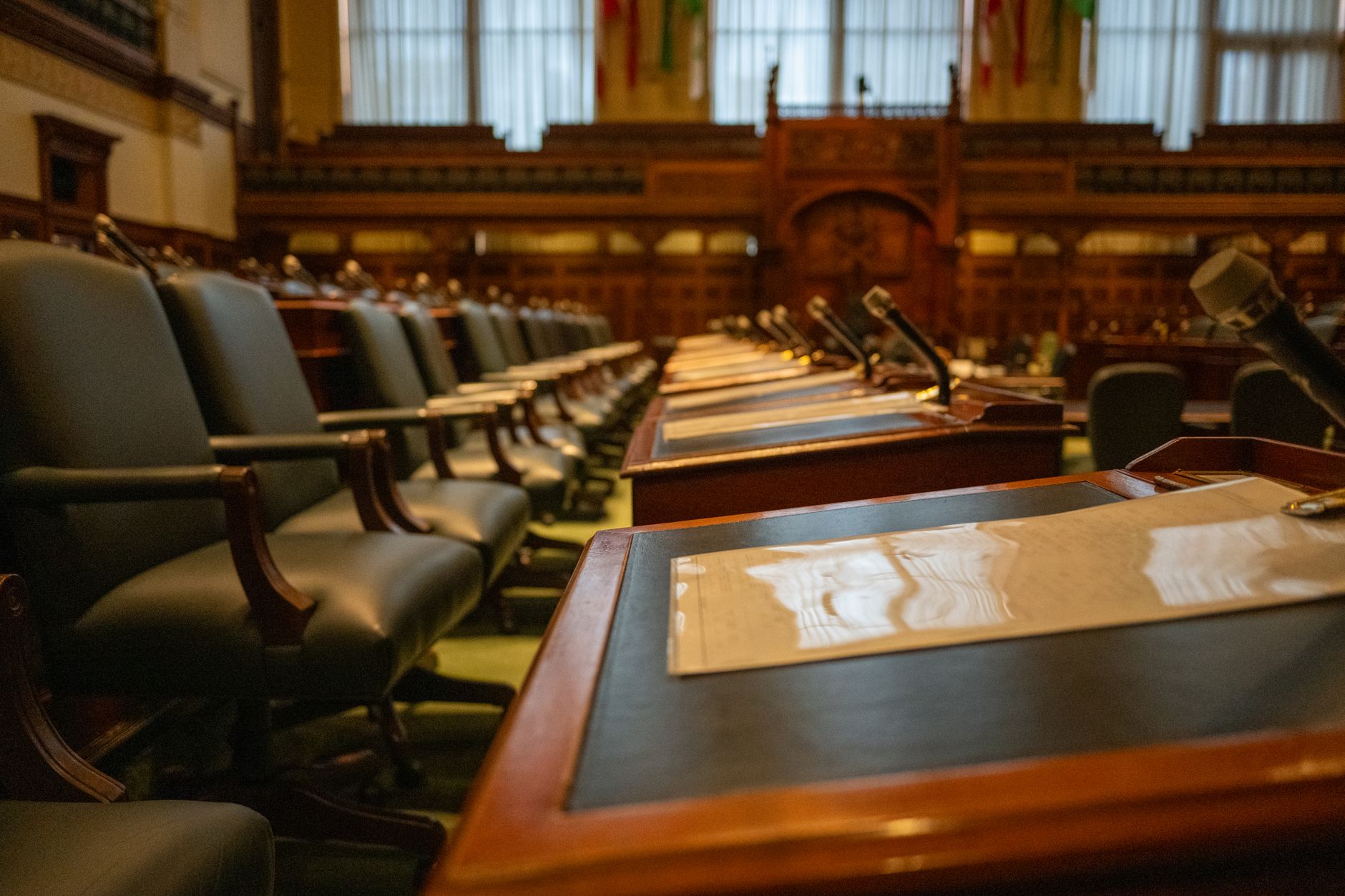 Empty diplomatic negotiation table representing ongoing U.S.-Canada trade talks