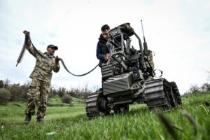 Military drone on an open field representing frontline robotic warfare